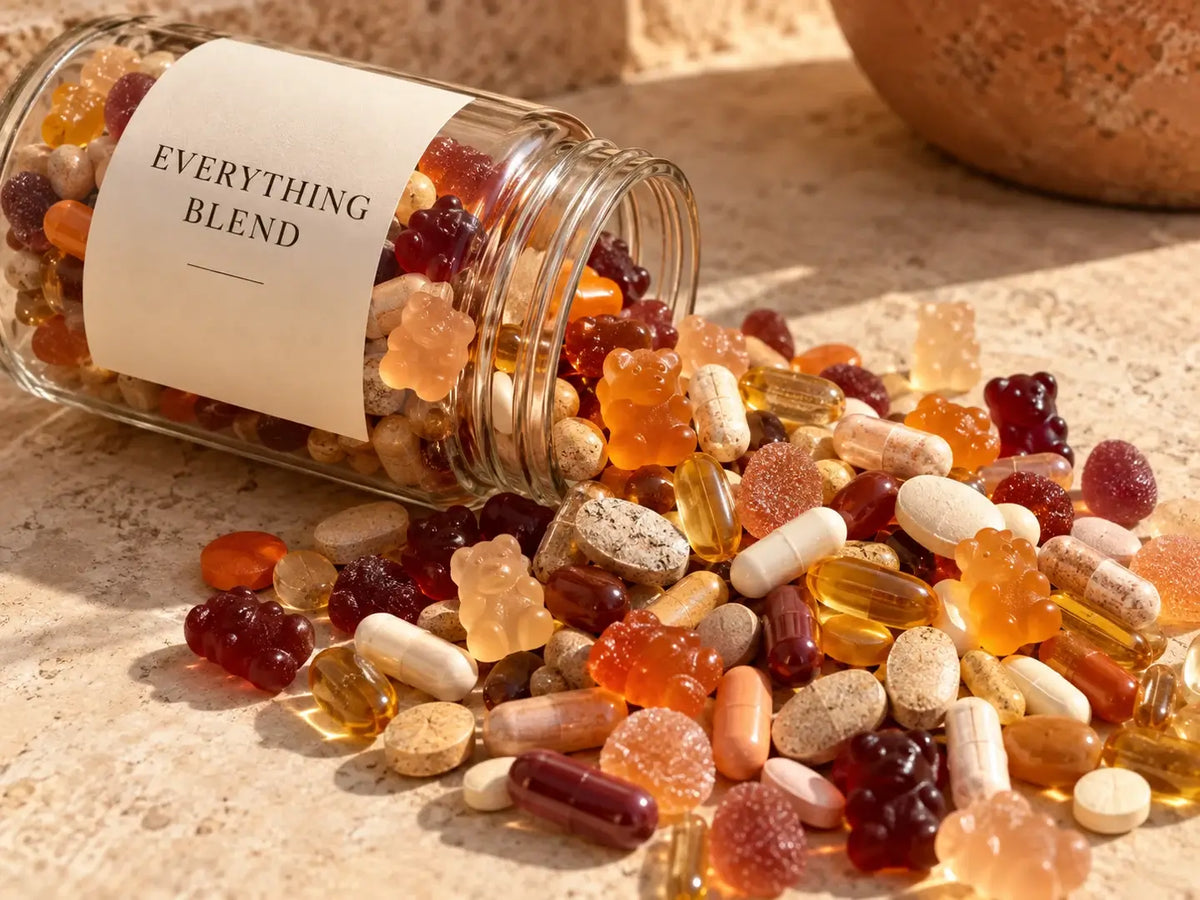 An everything blend spilling assorted gummies and capsules